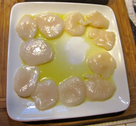 sliced scallops on the plate
